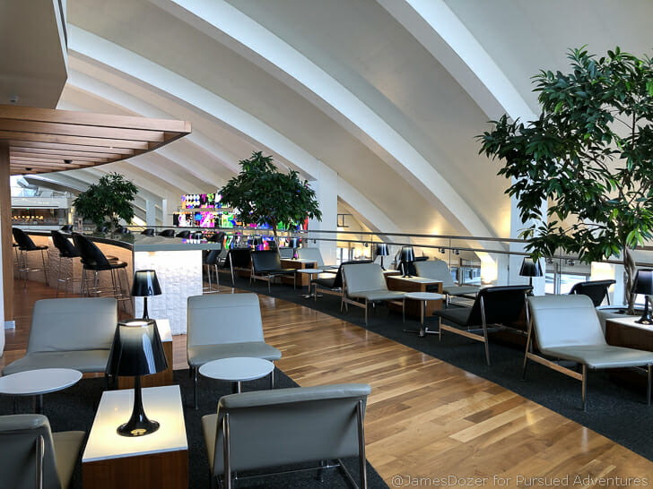 a room with a large ceiling and a large tree