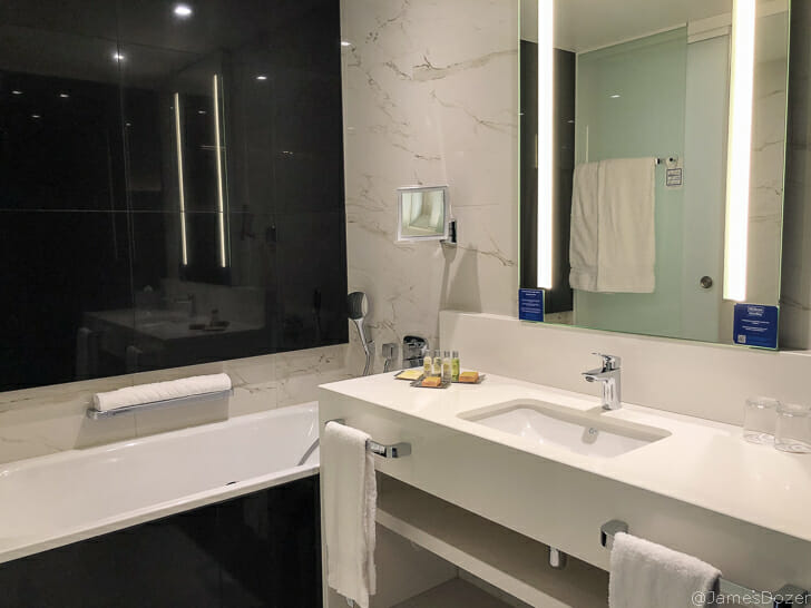 a bathroom with a bathtub and sink