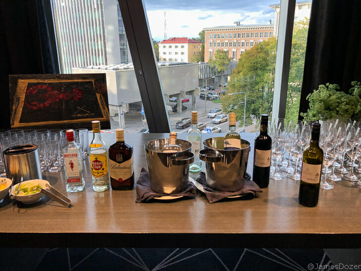 a table with bottles and glasses