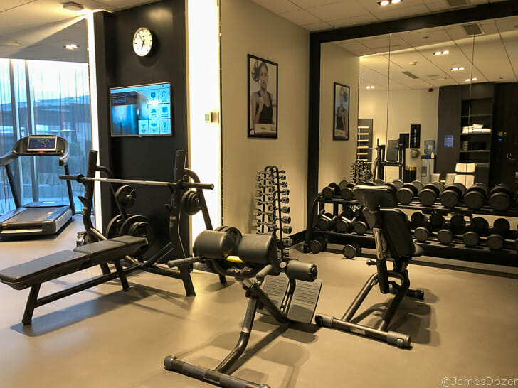 a room with weights and exercise equipment