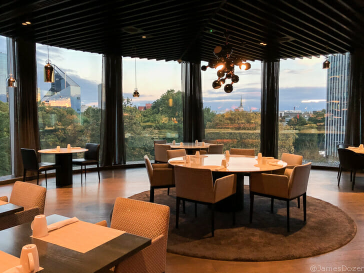 a room with tables and chairs