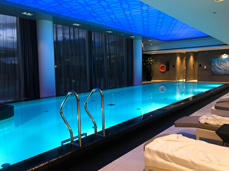 a swimming pool with a blue light
