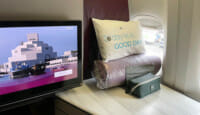 a tv and other items on a table