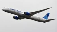a plane flying in the sky