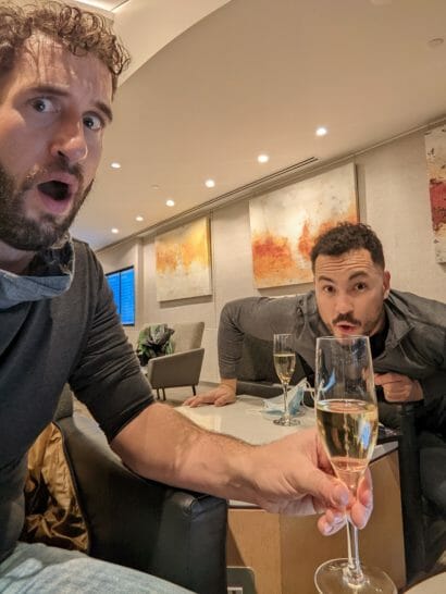 a man holding a glass of champagne
