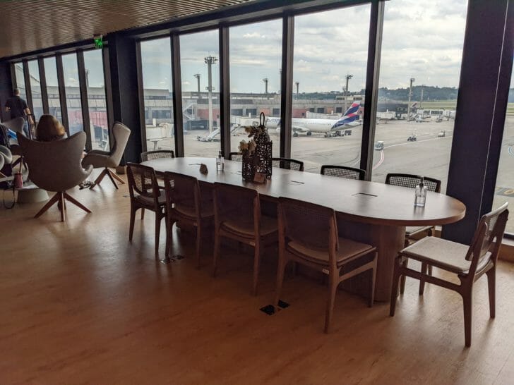 a room with a table and chairs