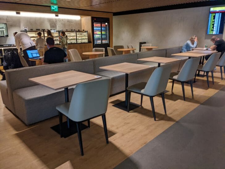a group of people sitting at tables