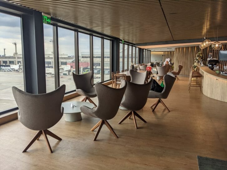 a room with chairs and tables