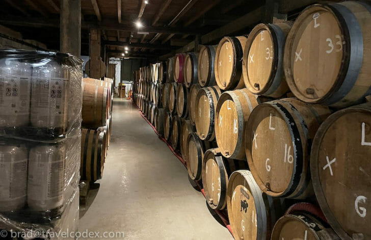 a group of barrels stacked in a row