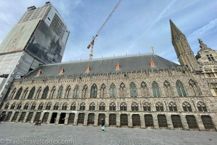 a building with a crane in the background