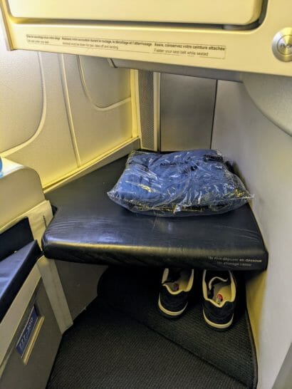 a seat with a bag on it