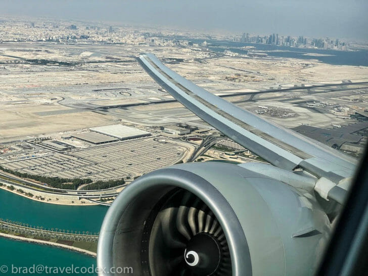 an airplane wing and engine of an airplane