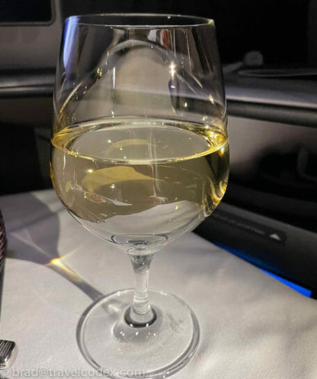 a glass of wine on a table