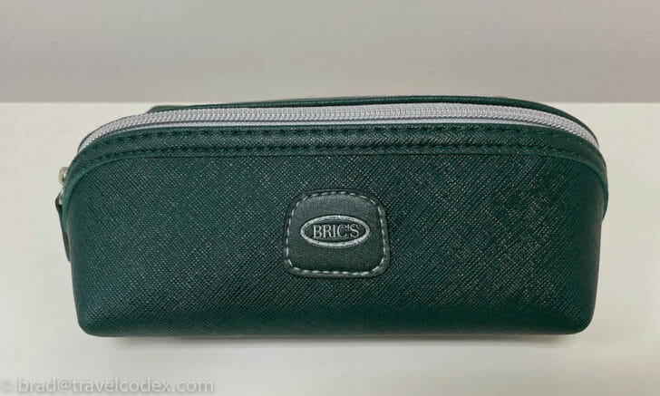 a green zippered wallet