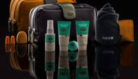a group of travel items on a black surface