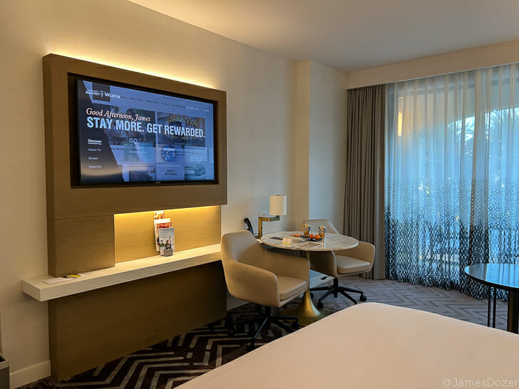 a room with a television and a table