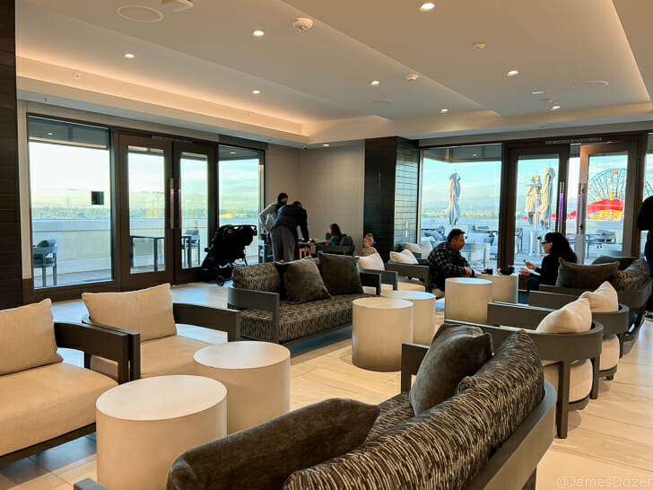 a room with many chairs and tables