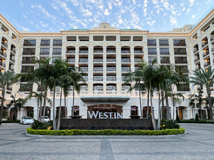 a building with palm trees