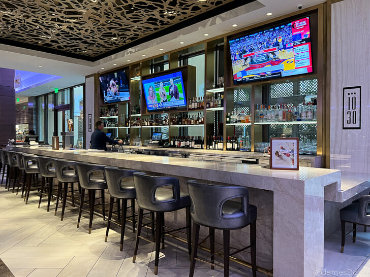 a bar with a bar and tvs