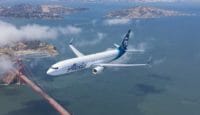 an airplane flying over water