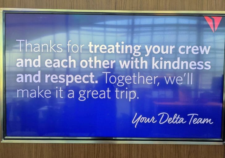 a blue sign with white text