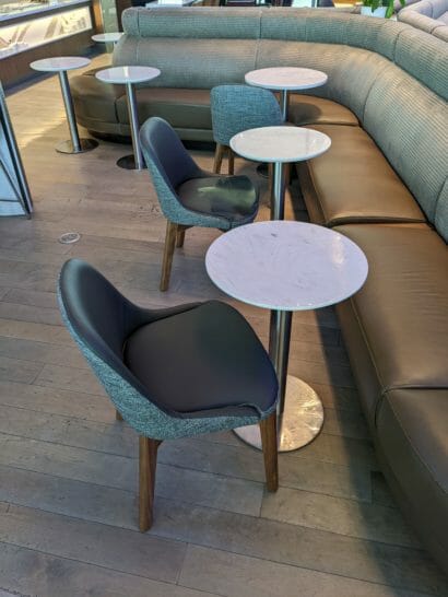 a group of tables and chairs in a room
