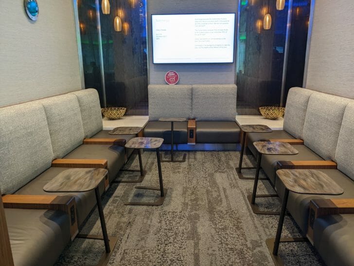 a room with a large white screen