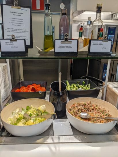 a buffet with food in bowls