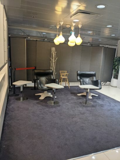 a room with chairs and tables