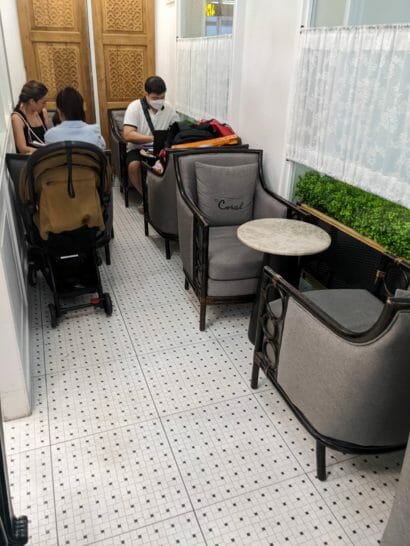 people sitting in chairs in a room