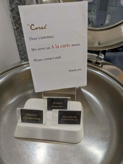 a sign on a metal tray