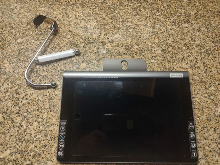 a tablet with a hook on a marbled surface