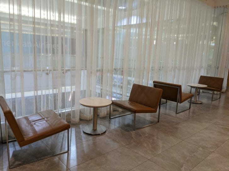 a room with chairs and tables