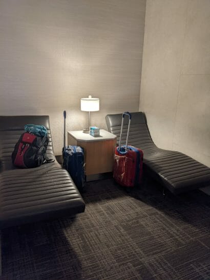 a chair with luggage on it