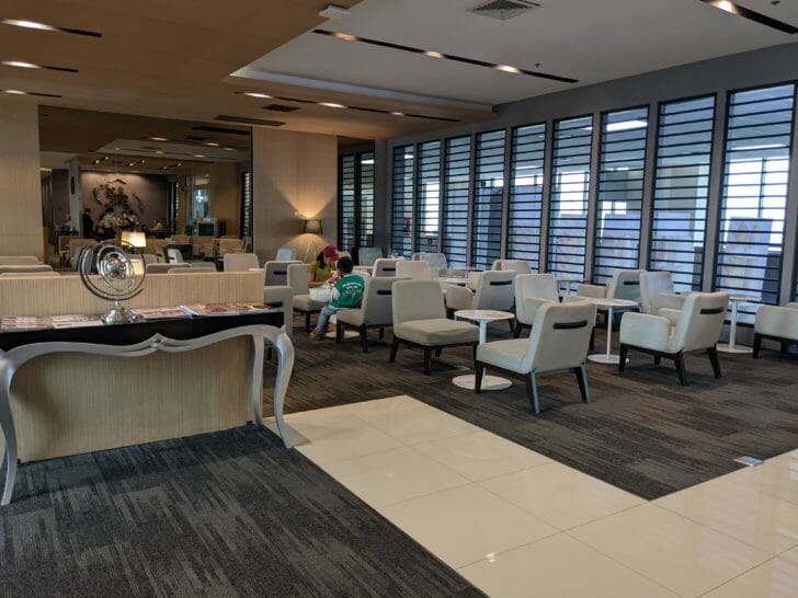 a room with chairs and tables