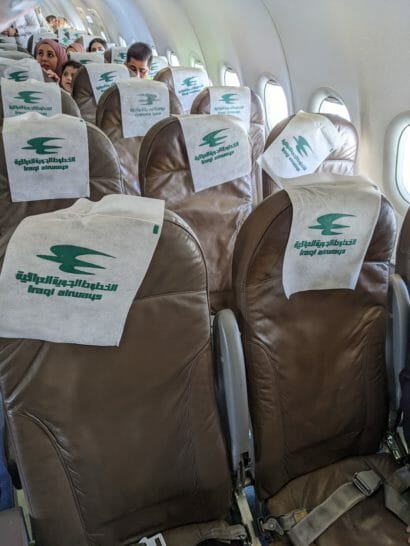 a group of seats with towels on them