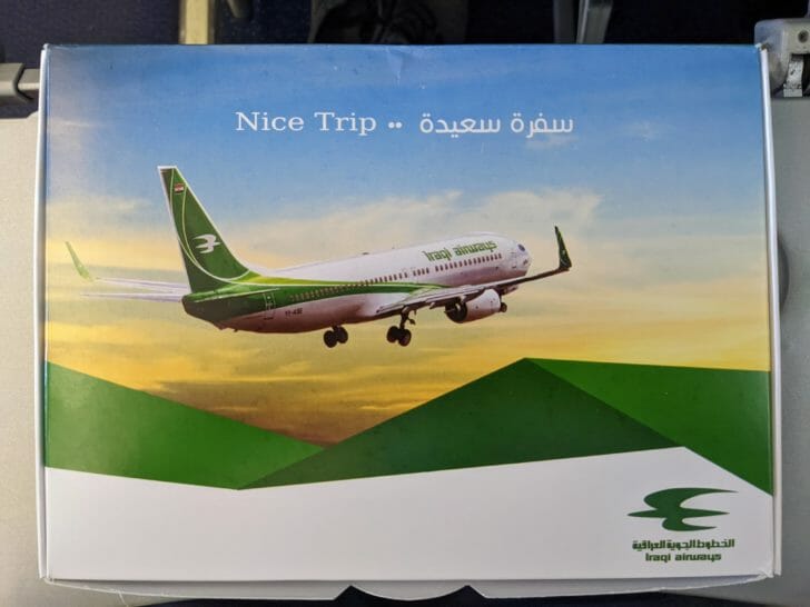 a book with a picture of a plane flying in the sky