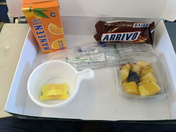 a tray with food and snacks on it