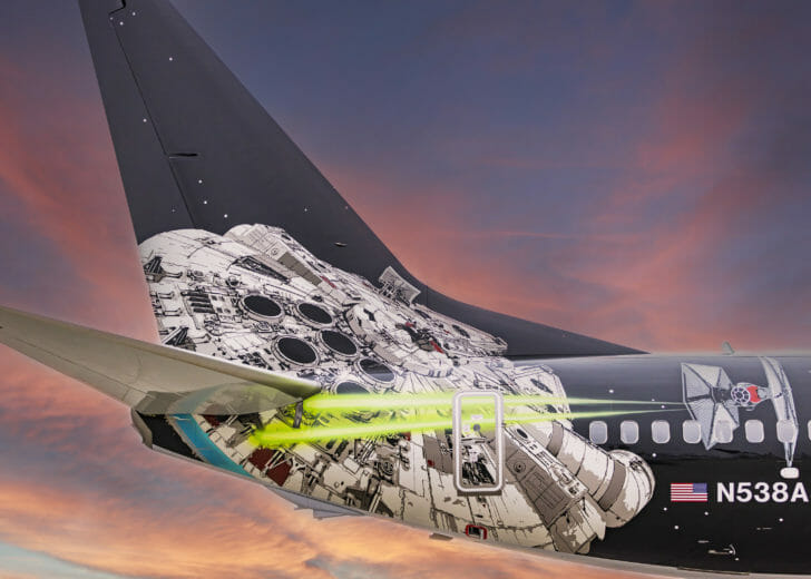 a plane with a space shuttle painted on it