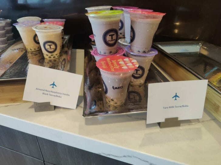 a group of cups of milk on a table
