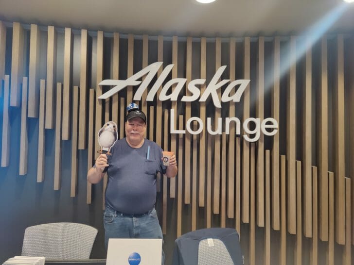 a man holding a bird