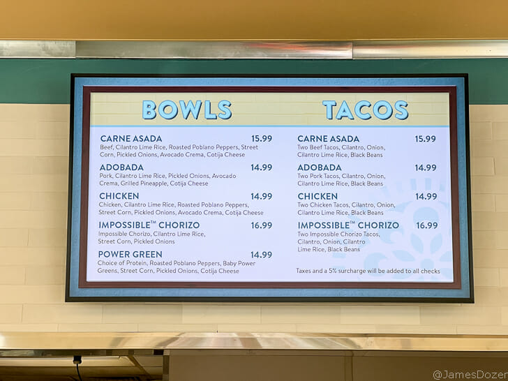 a menu board with price list