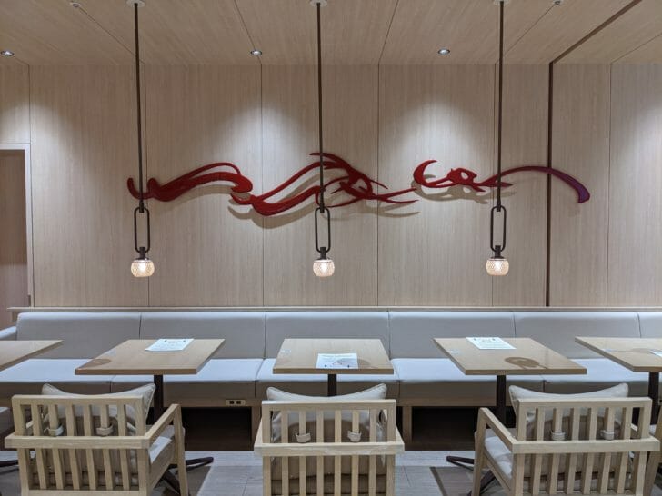 a room with tables and chairs