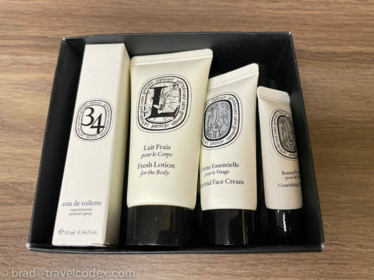 a box of cosmetics on a wood surface