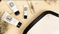 a group of small bottles of cosmetics