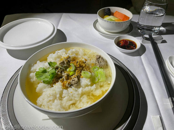 a bowl of soup with meat and vegetables