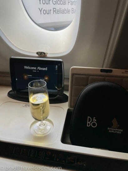 a glass of champagne on a table