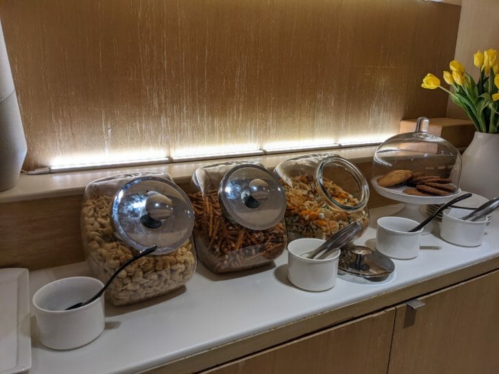 a group of glass containers with food on a counter