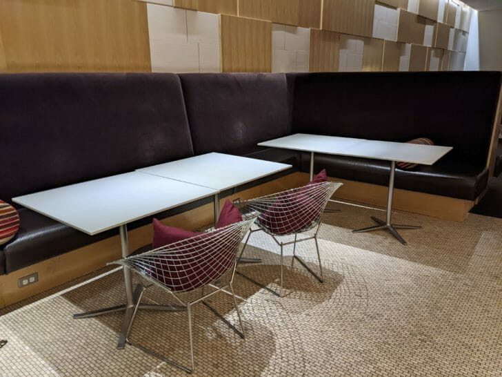a table and chairs in a booth