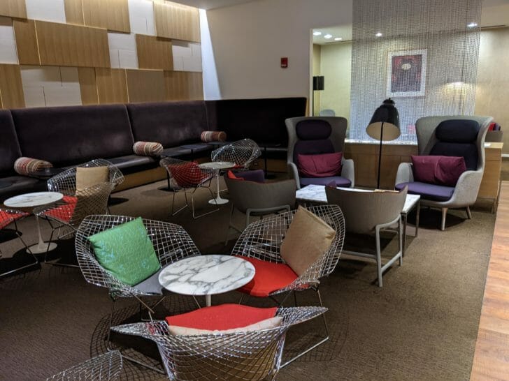 a room with chairs and tables